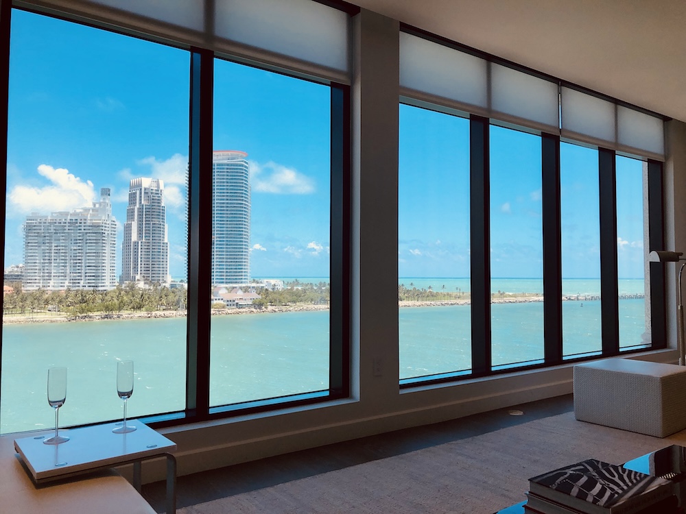 Fisher Island residence interior with floor-to-ceiling ocean views